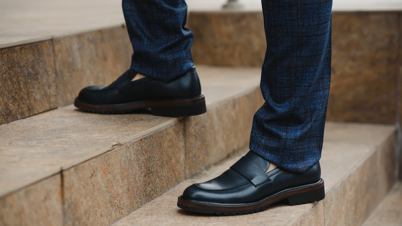 6. Finish outfits with polished leather loafers