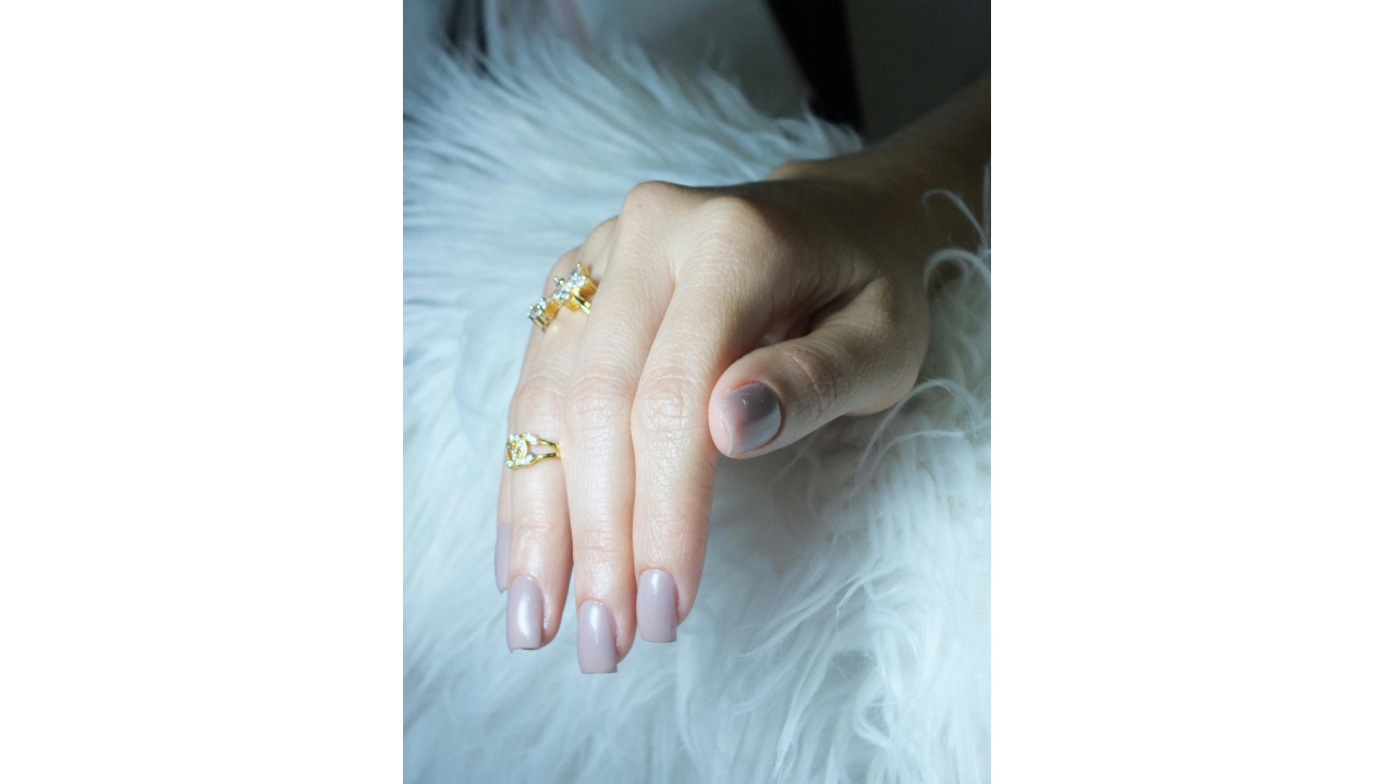 2. Stick to understated nail polish