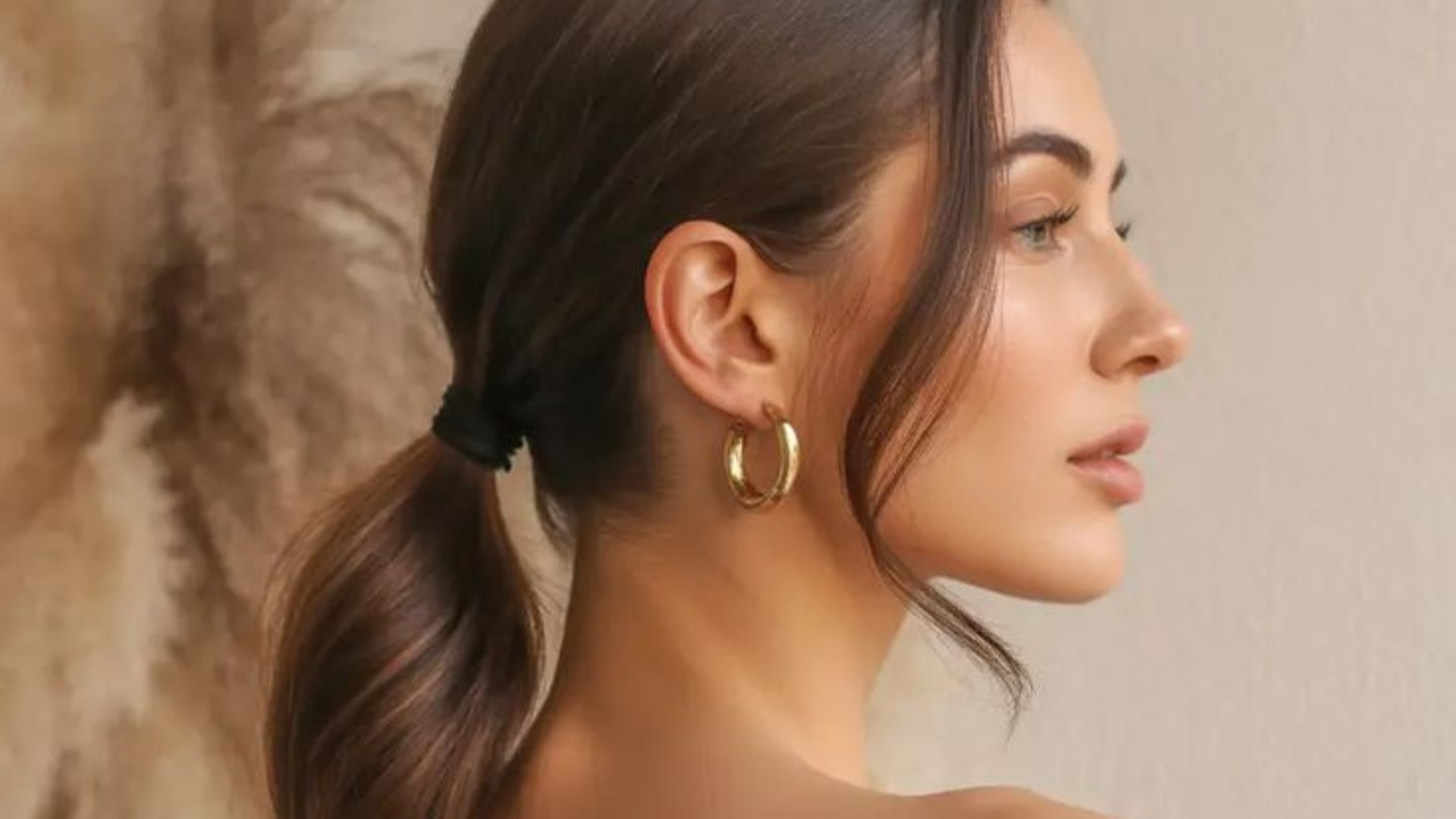 7. Sleek Low Ponytail