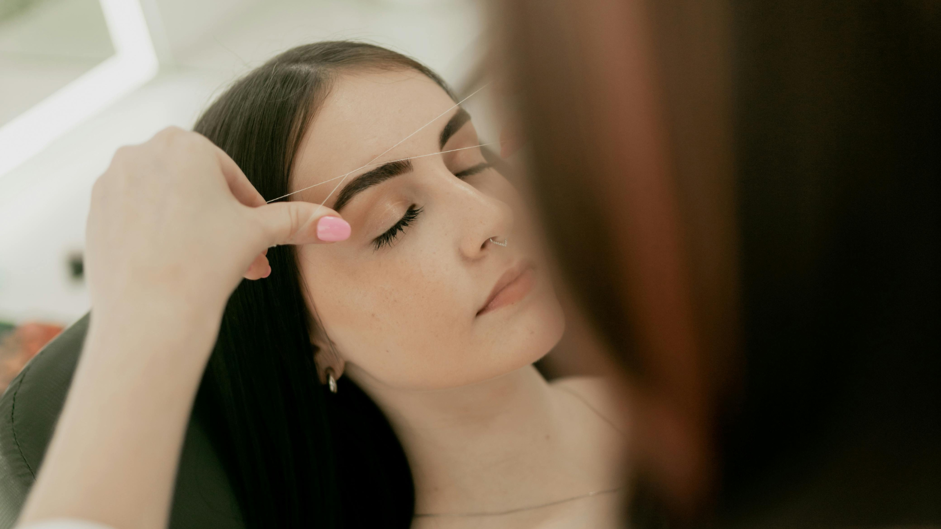 4. Tidy your eyebrows for a cleaner frame